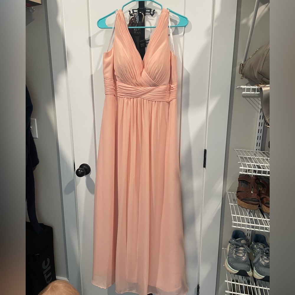 Pale pink bridesmaid’s dress